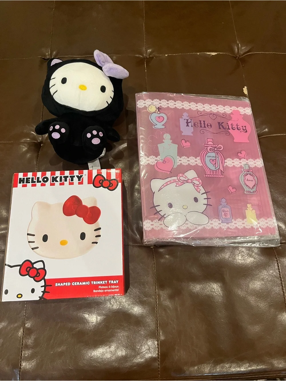 Sanrio Hello Kitty bundle (shaped ceramic trinket tray, binder, halloween plush)